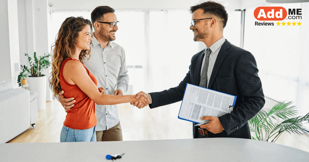 Real estate agent shaking hands with customers